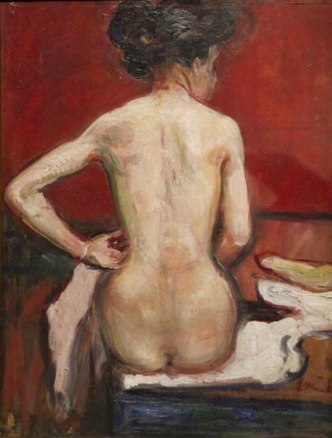 View from the back of a nude female sitting on a red background - Edvard Munch