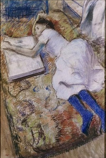 Young girl lying down looking at an album - Edgar Degas